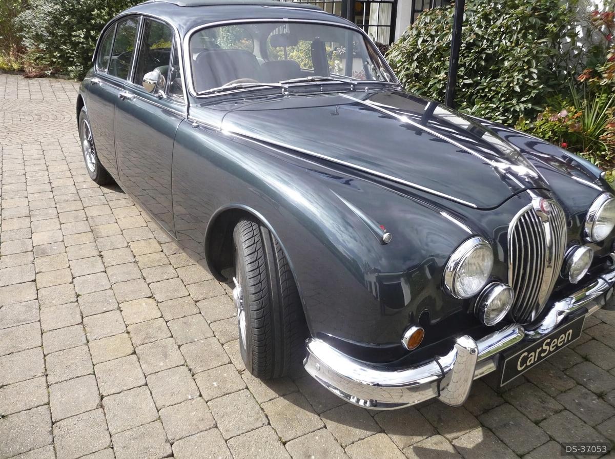 Dark grey Jaguar Mk2 saloon on a paved drive in Bangor